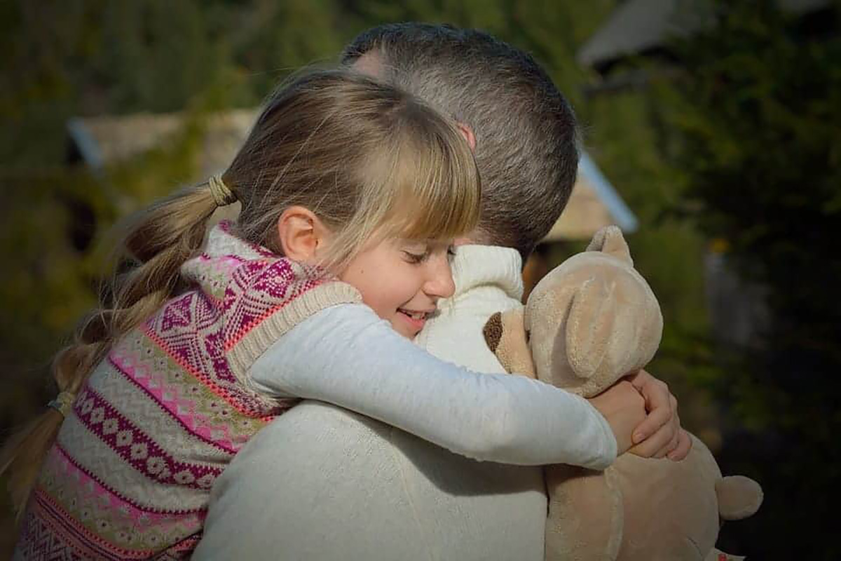 Père et fille, calin