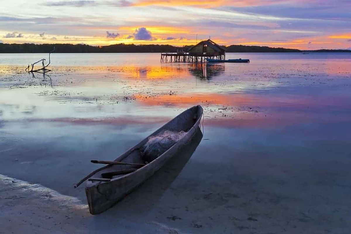 Pirogue, coucher de soleil
