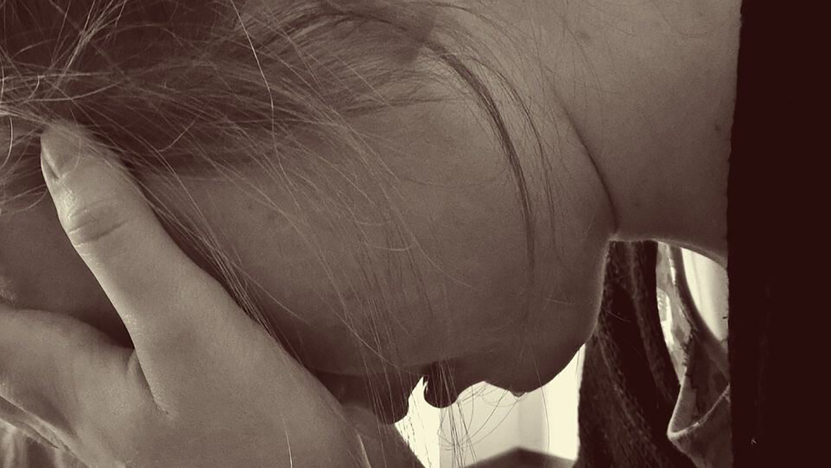 Femme en larmes.